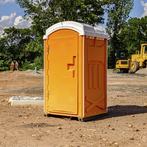 how often are the portable restrooms cleaned and serviced during a rental period in Komatke AZ